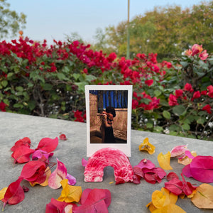 Red Polaroid Stand